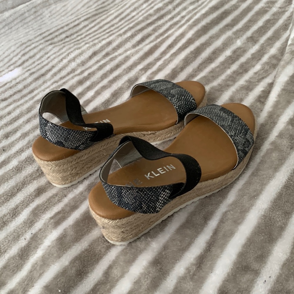 Women’s leopard and black wedges.
